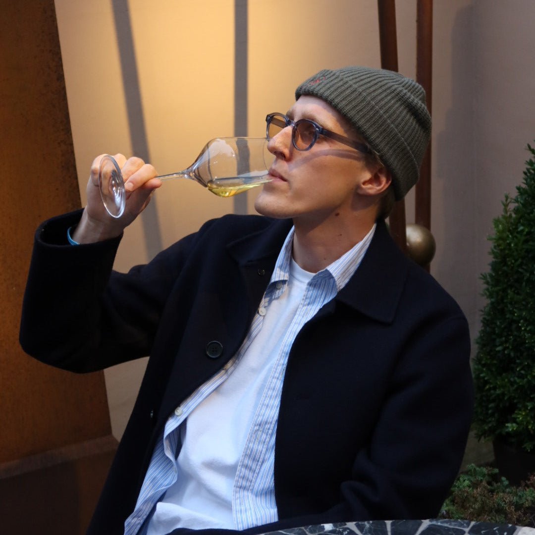 Der Club Social du Vin. Mütze „Flasche“.